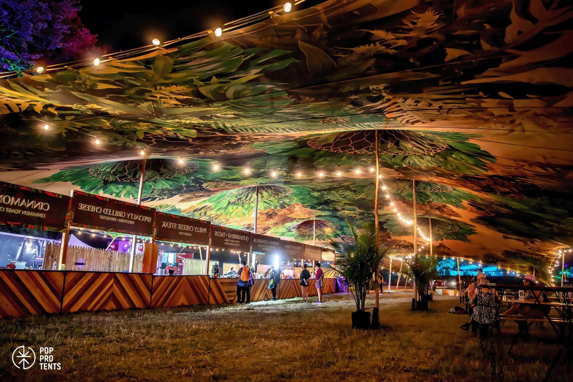 Stretch tent over food and beverage area at festival